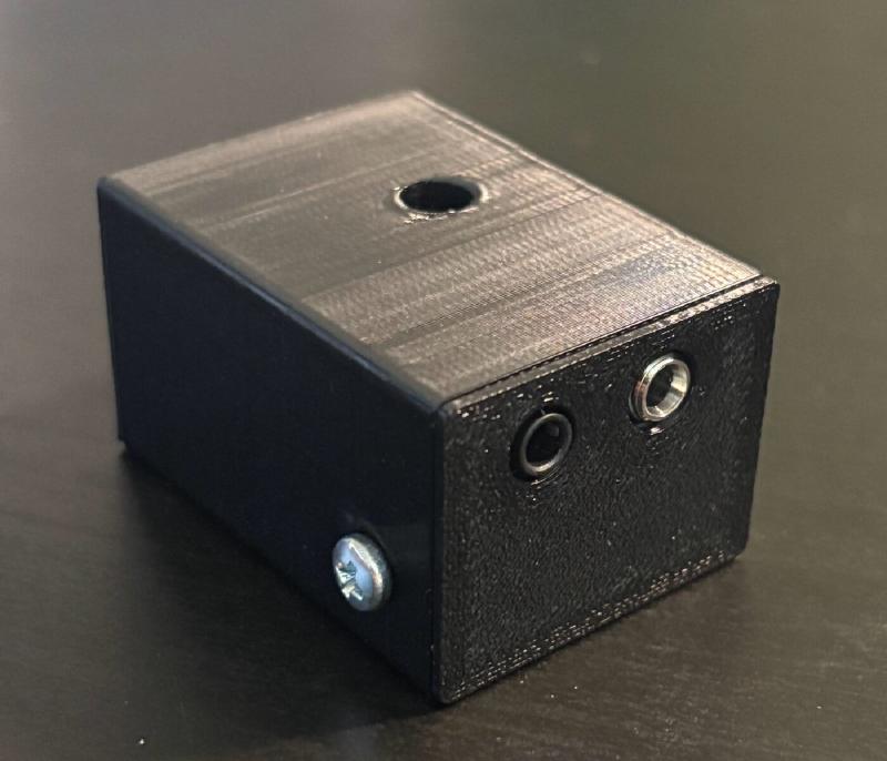 A Vail Adapter, with jacks for a key/paddle and radio keying output